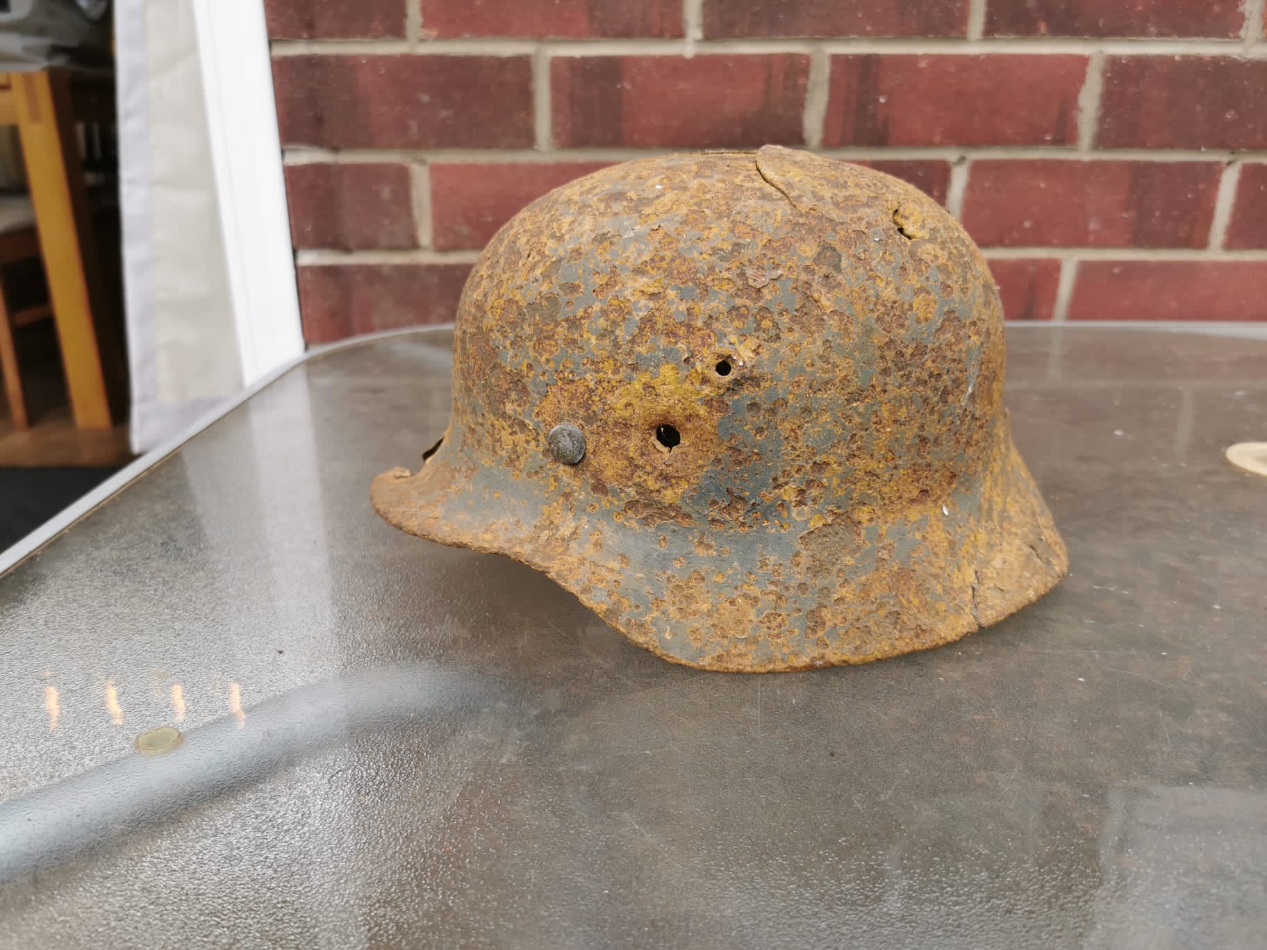 ww2 German helmet m40 battle damage (bullet holes)